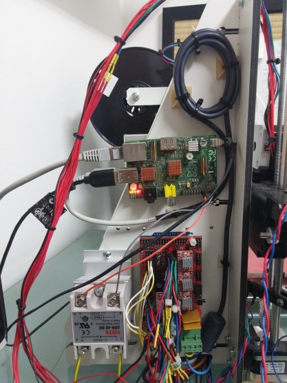 Raspberry Pi mounted on the printer. Excuse the cabling - i'm still working on that.